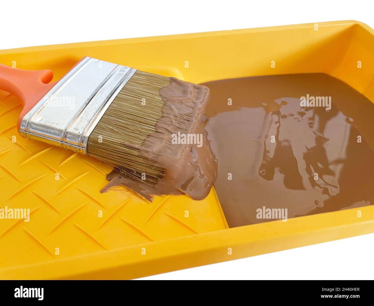 Green paint tray with brush on white background Stock Photo Alamy