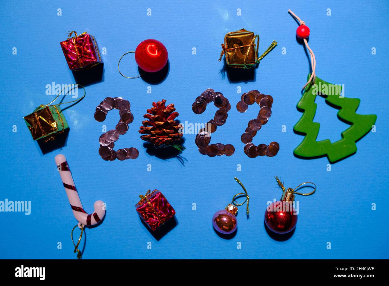 Lightbox with 2022 numbers and toys. Stock Photo