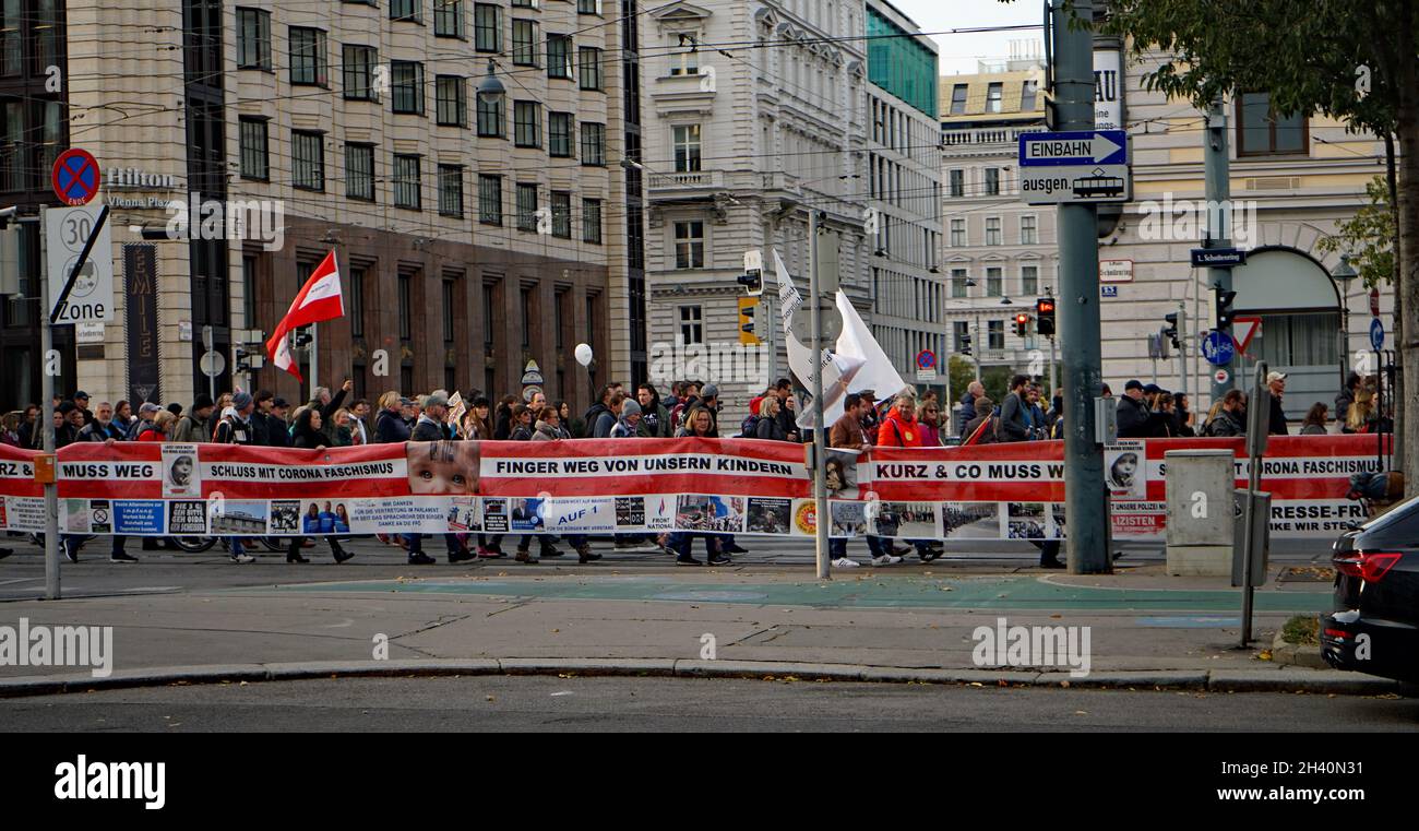 Wien, 26.10.2021: Demonstration Protest against the Corona Fascism people calling 'Widerstand', 'Finger weg von unseren Kindern' Stock Photo