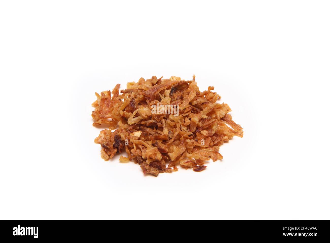 The small pile of deep fried onion, the great topping on hot dogs or other dishes. Stock Photo