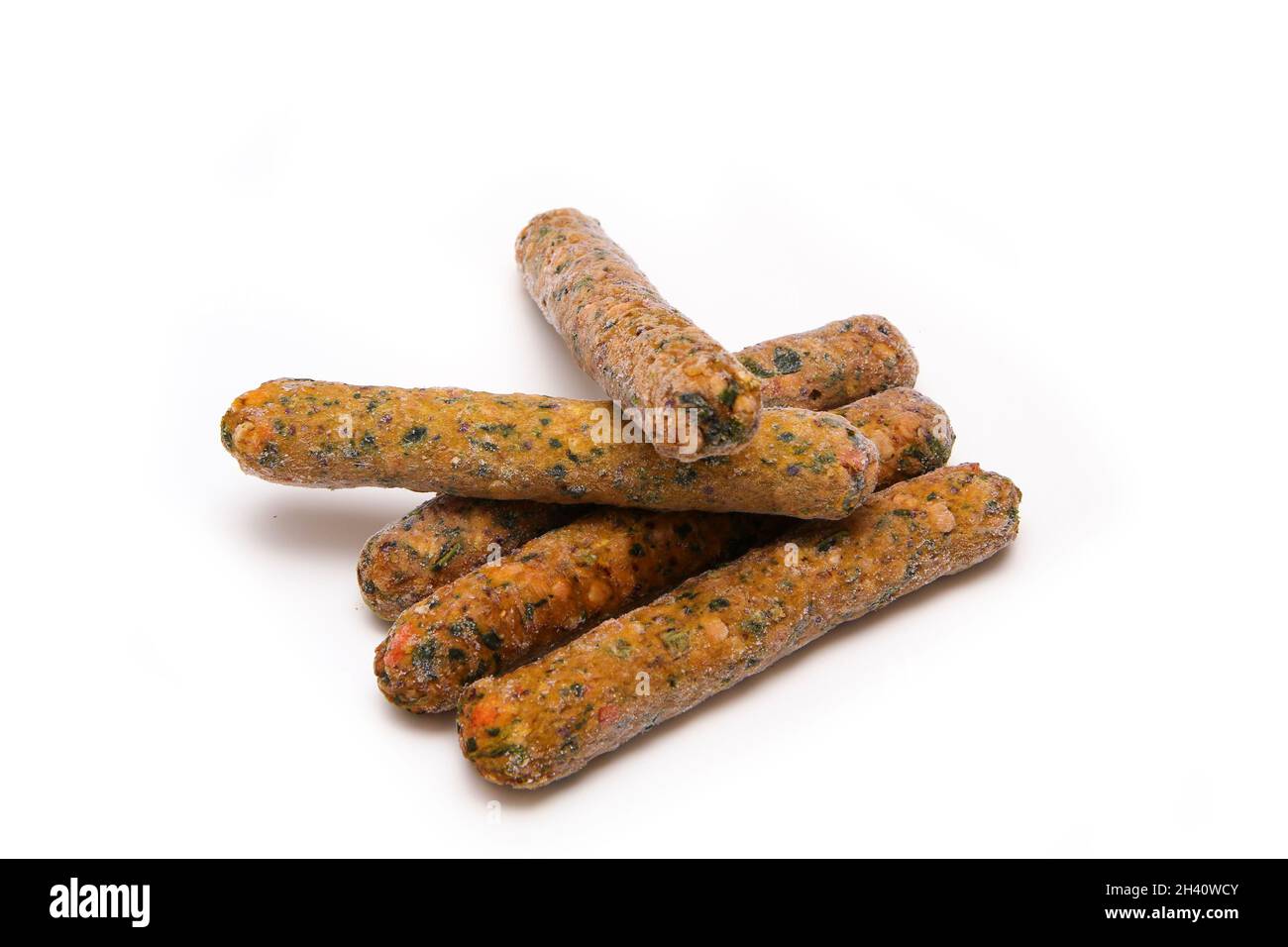Several frozen ready to cook vegetarian sausages made of vegetables