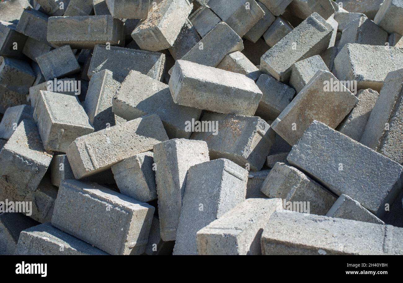 Pile of concrete cobblestones. Improvement of the city Infrastructure Stock Photo