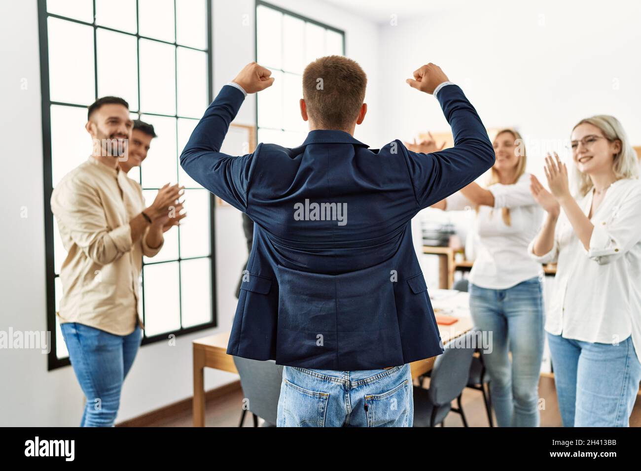 Positive man woman workers clap hi-res stock photography and images - Alamy