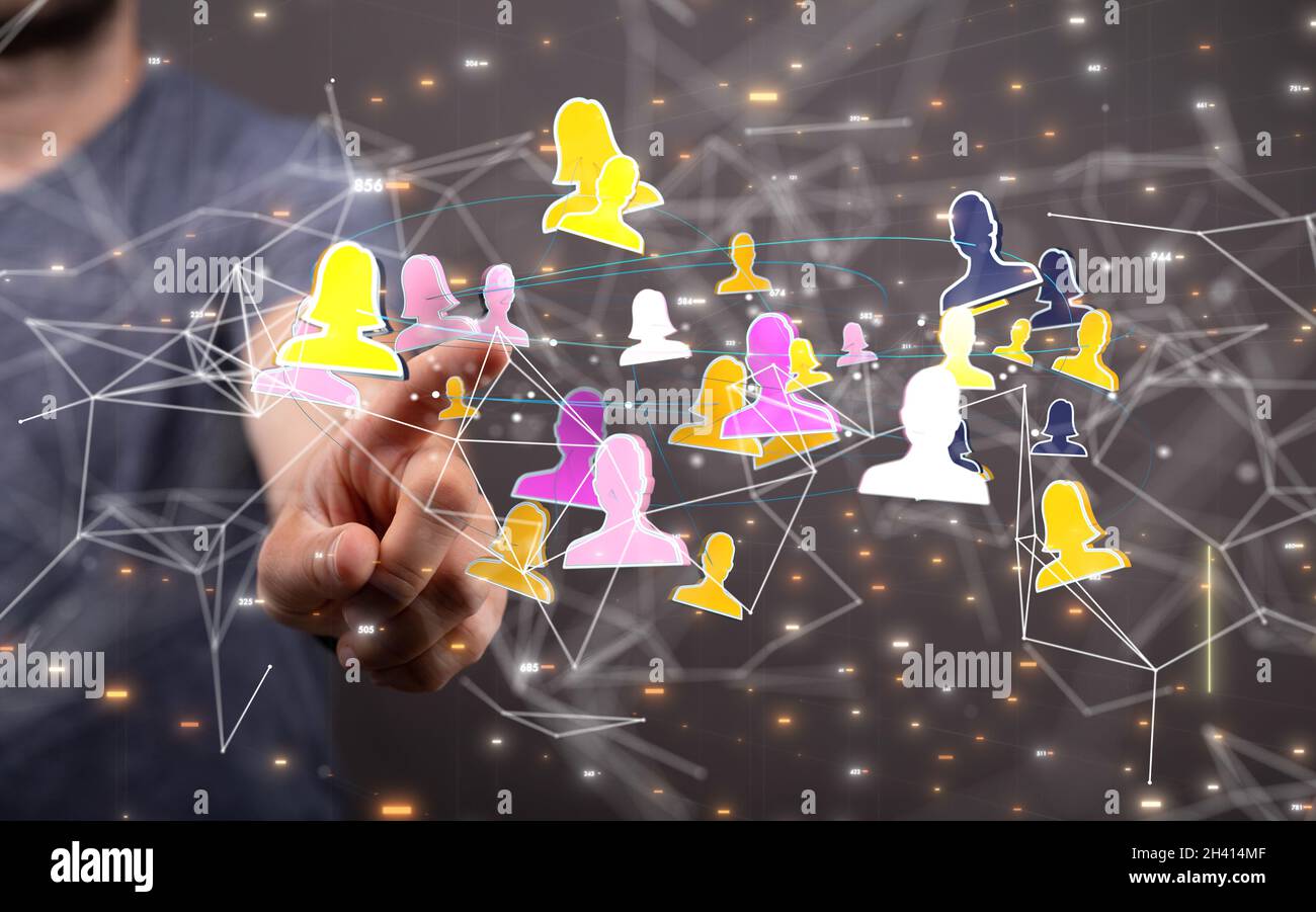 A 3D rendering of a group of floating people icons on a businessman's ...