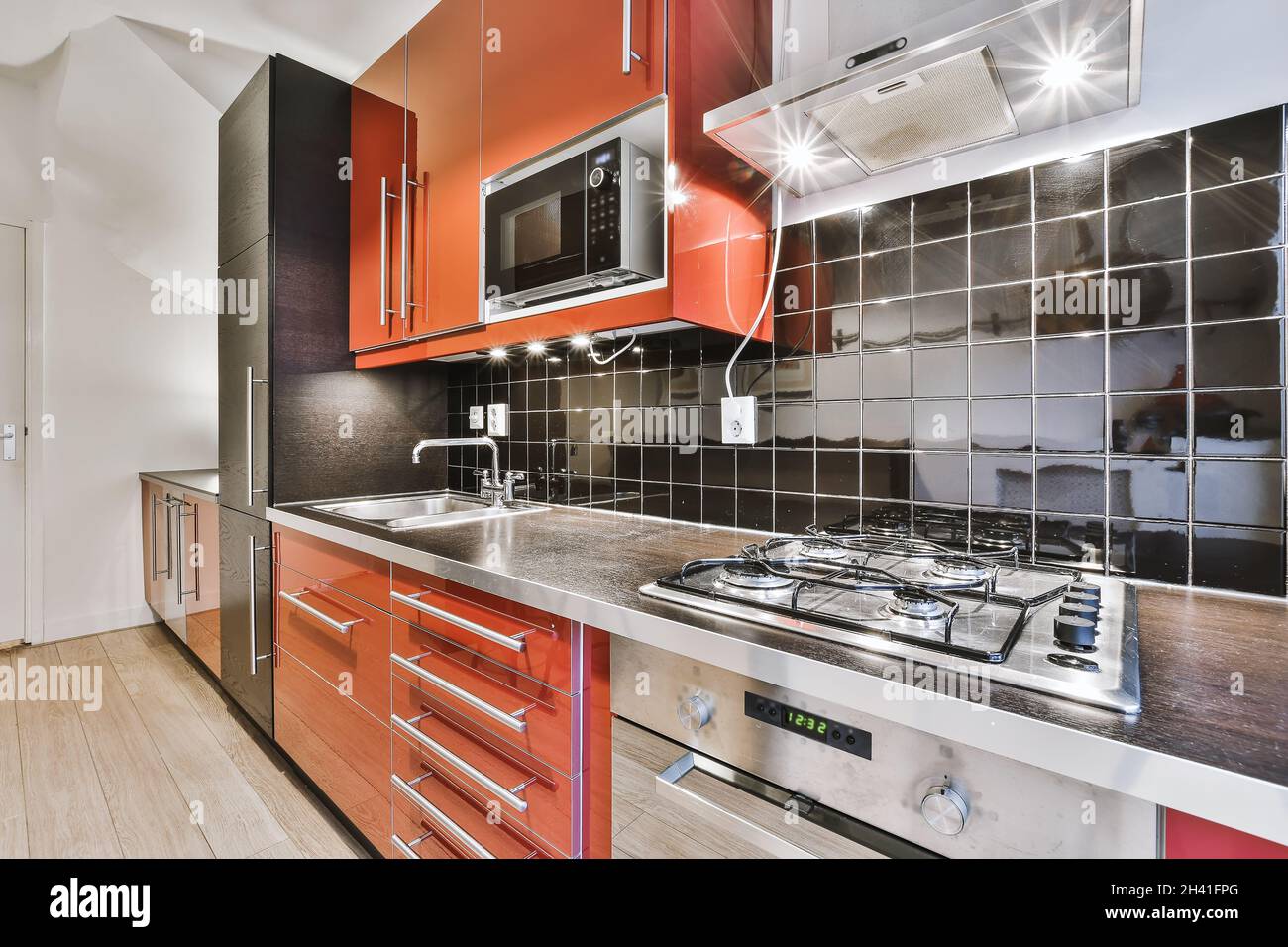 Pretty kitchen design with multicolored kitchen set Stock Photo Alamy