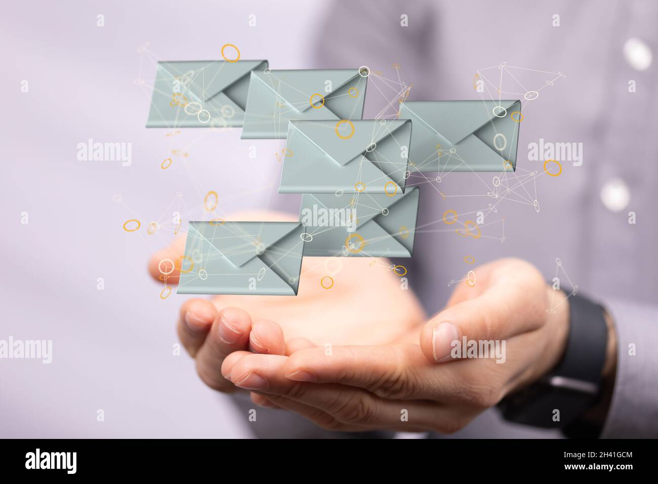 A 3D rendering of a group of floating people icons on a businessman's ...