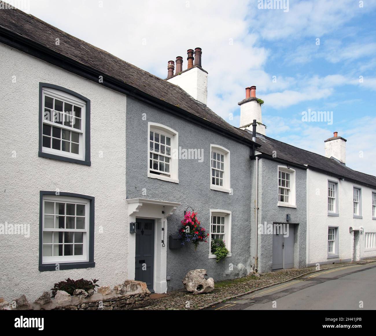 Street of old picturesque houses in the village of cartmel in cumbria Stock Photo Alamy