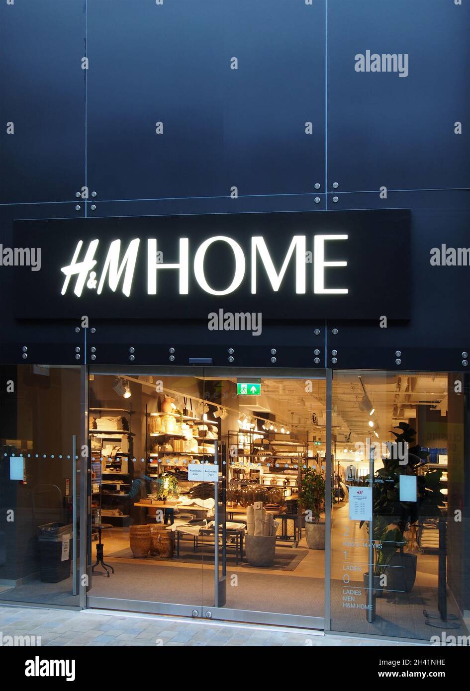 Sign above a h and m home retail store in leeds city centre Stock Photo