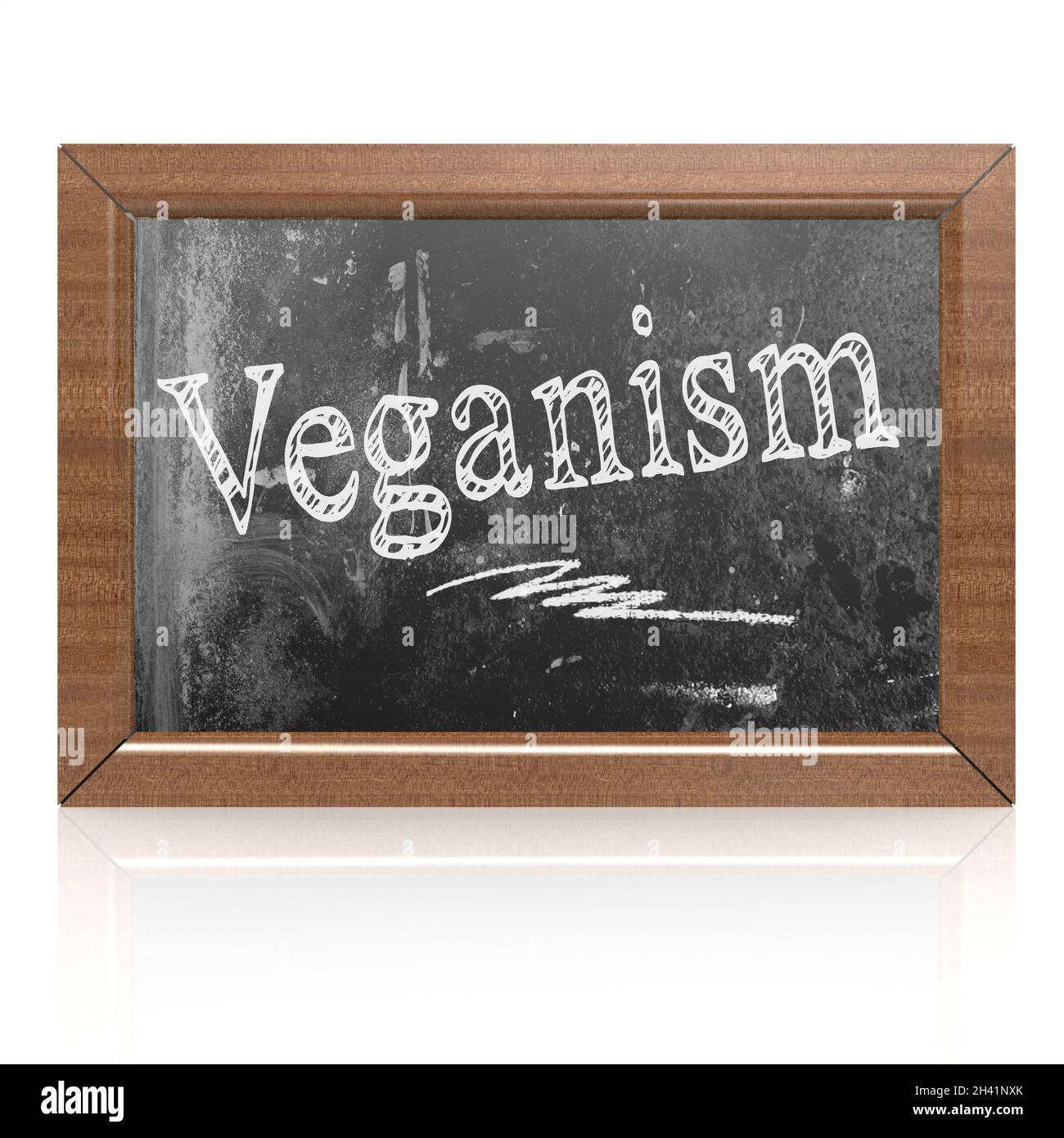Veganism text written on blackboard Stock Photo