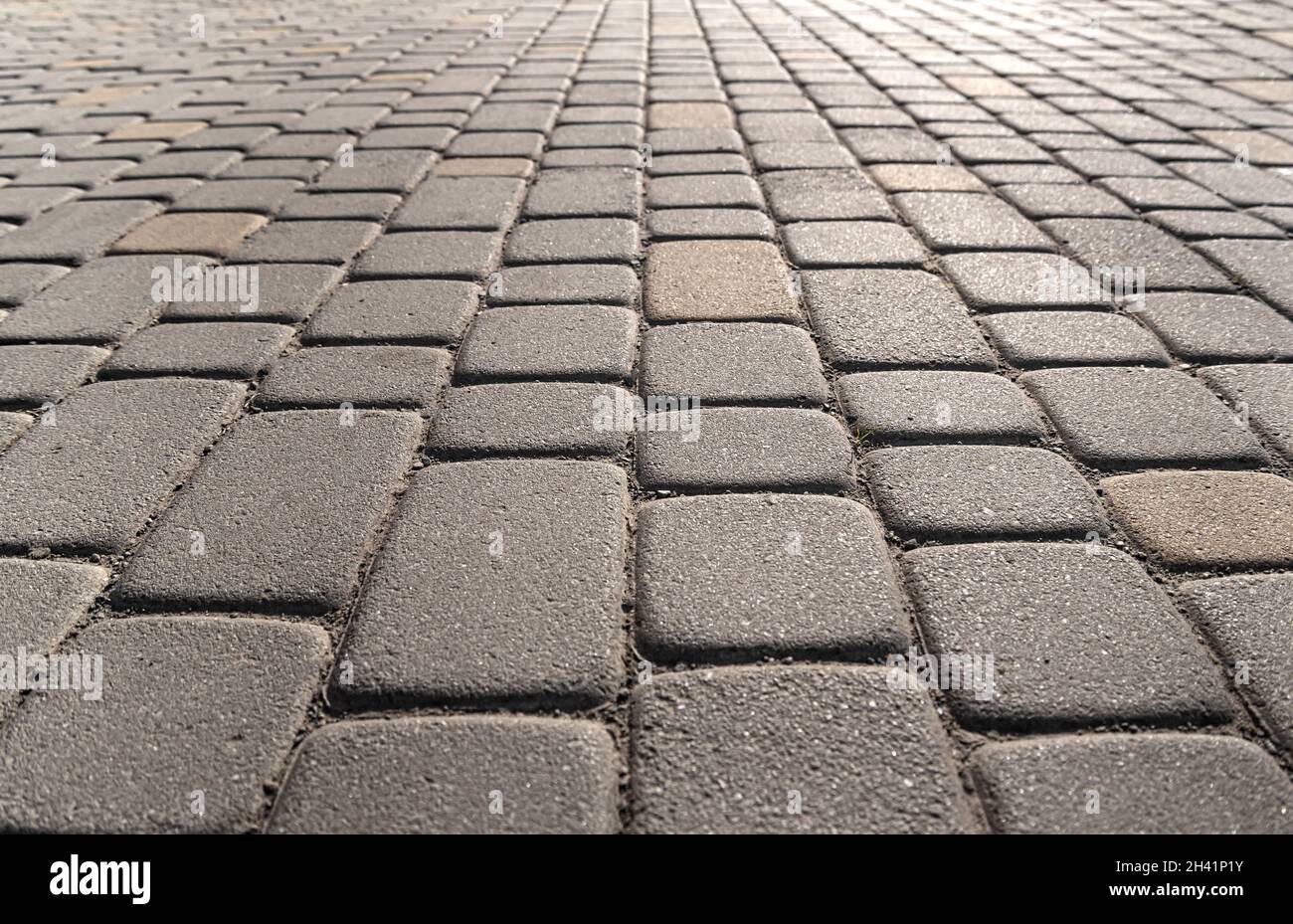 Background from gray paving stones. Stock Photo