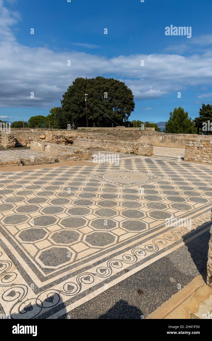 Roman Mozaic floor, Empúries (Catalan: Empúries [əmˈpuɾiəs]) was an ancient city on the Mediterranean coast of Catalonia, Spain. Stock Photo