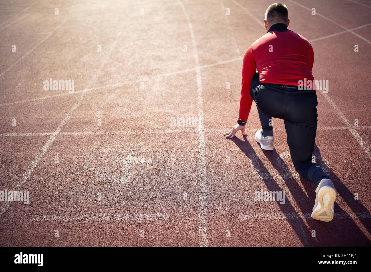 Professional athlete having a training on the stadium Stock Photo
