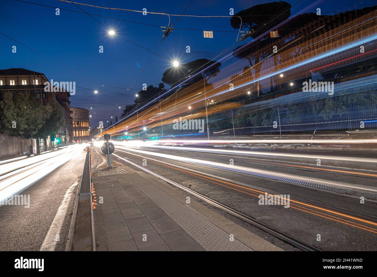 Colosseum at night Rome Italy with long exposure lights. Fast-moving ...