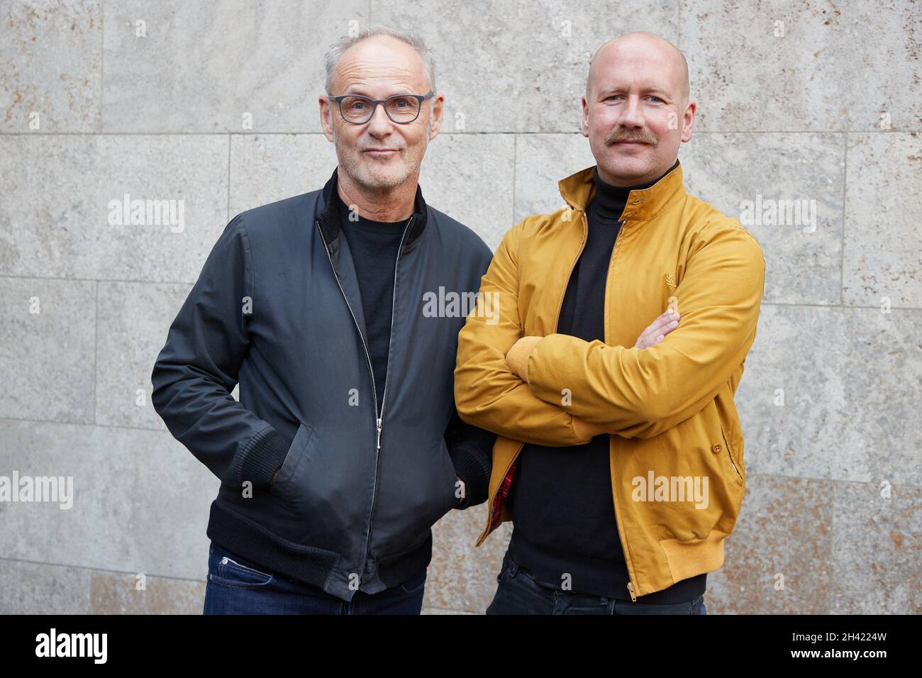 Hamburg, Germany. 31st Oct, 2021. Reinhold Beckmann (l), presenter and  author, and Ole Zeisler, journalist and author, come to an NDR press event  with a screening of the film: "Uwe Seeler -