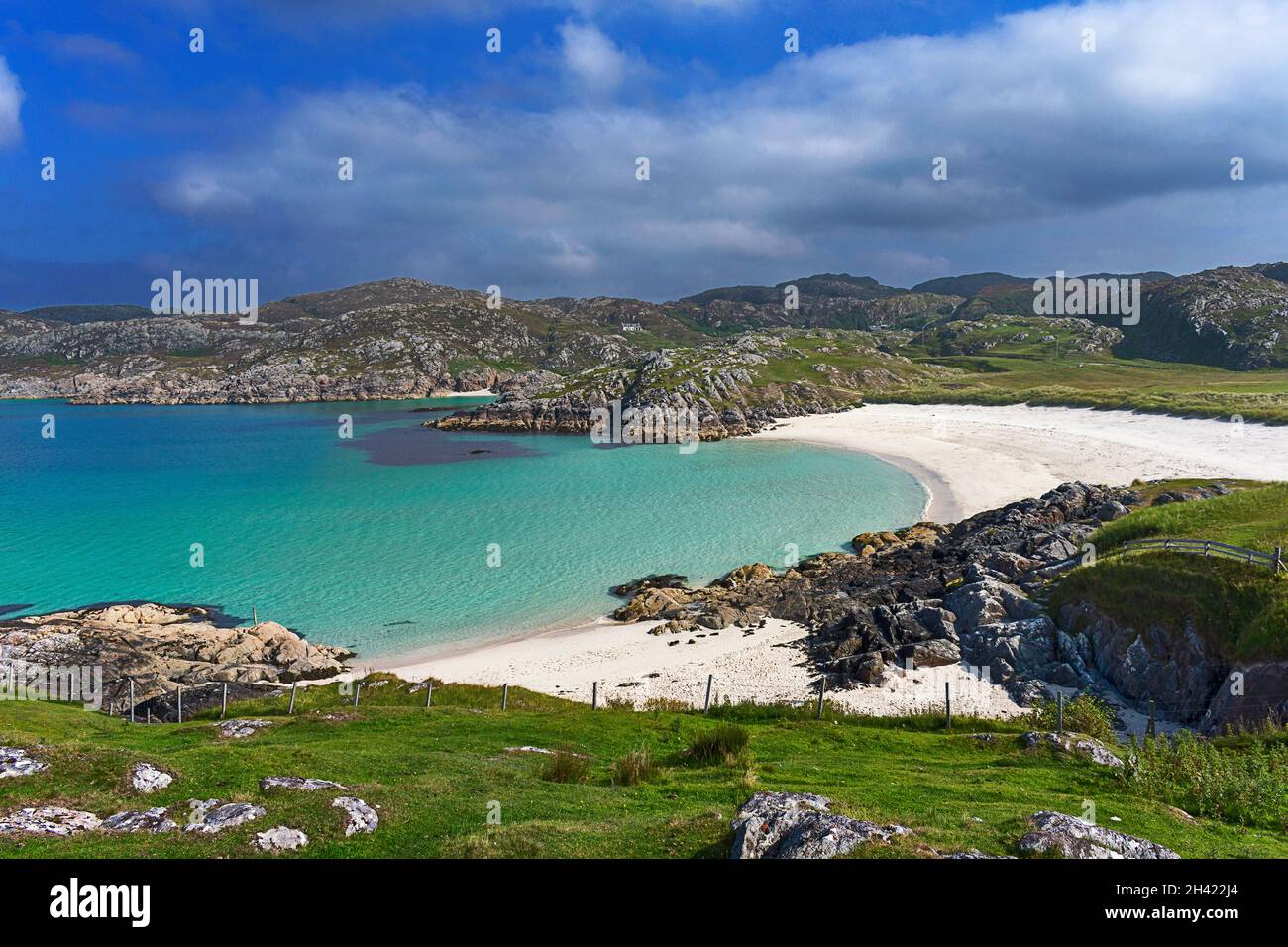ACHMELVICH LOCHINVER SUTHERLAND SCOTLAND BLUE SKY TURQUOISE SEA AND