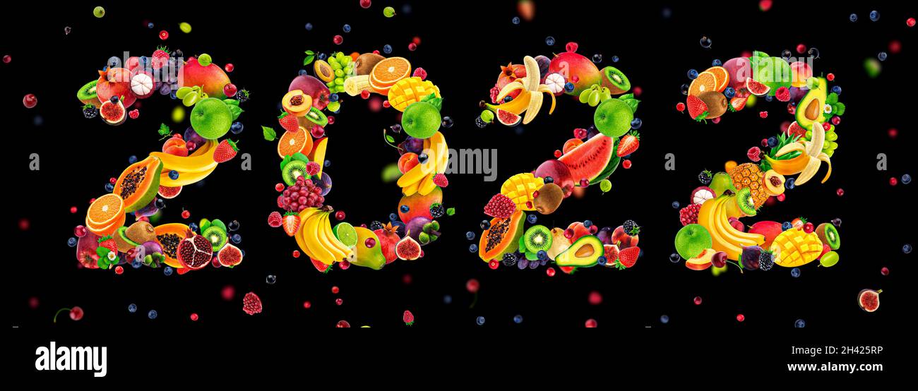 Happy New Year 2022 number made of fruits and berries Stock Photo