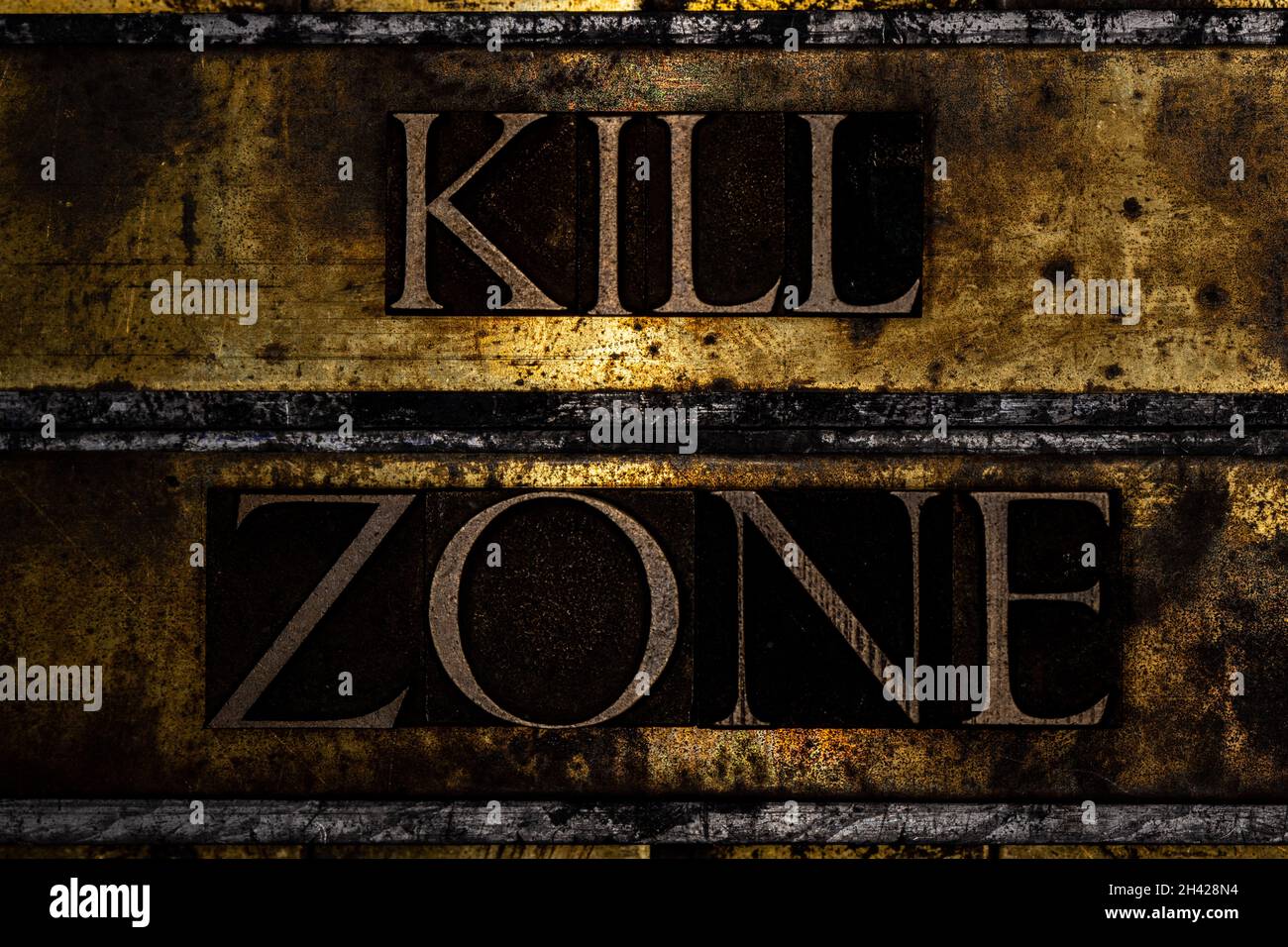 Kill Zone text message on textured grunge copper and vintage gold background Stock Photo