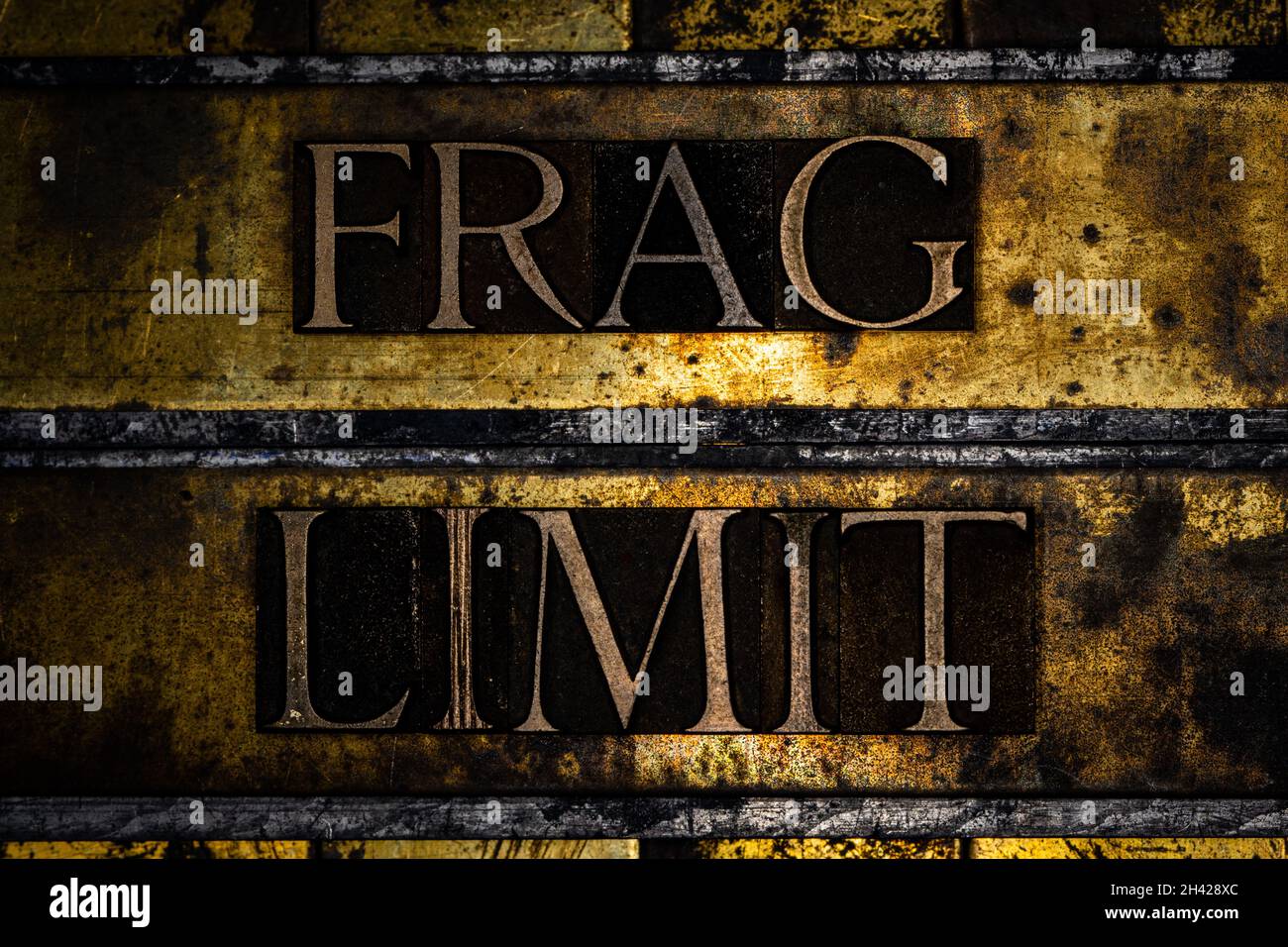 Frag Limit text message on textured grunge copper and vintage gold background Stock Photo