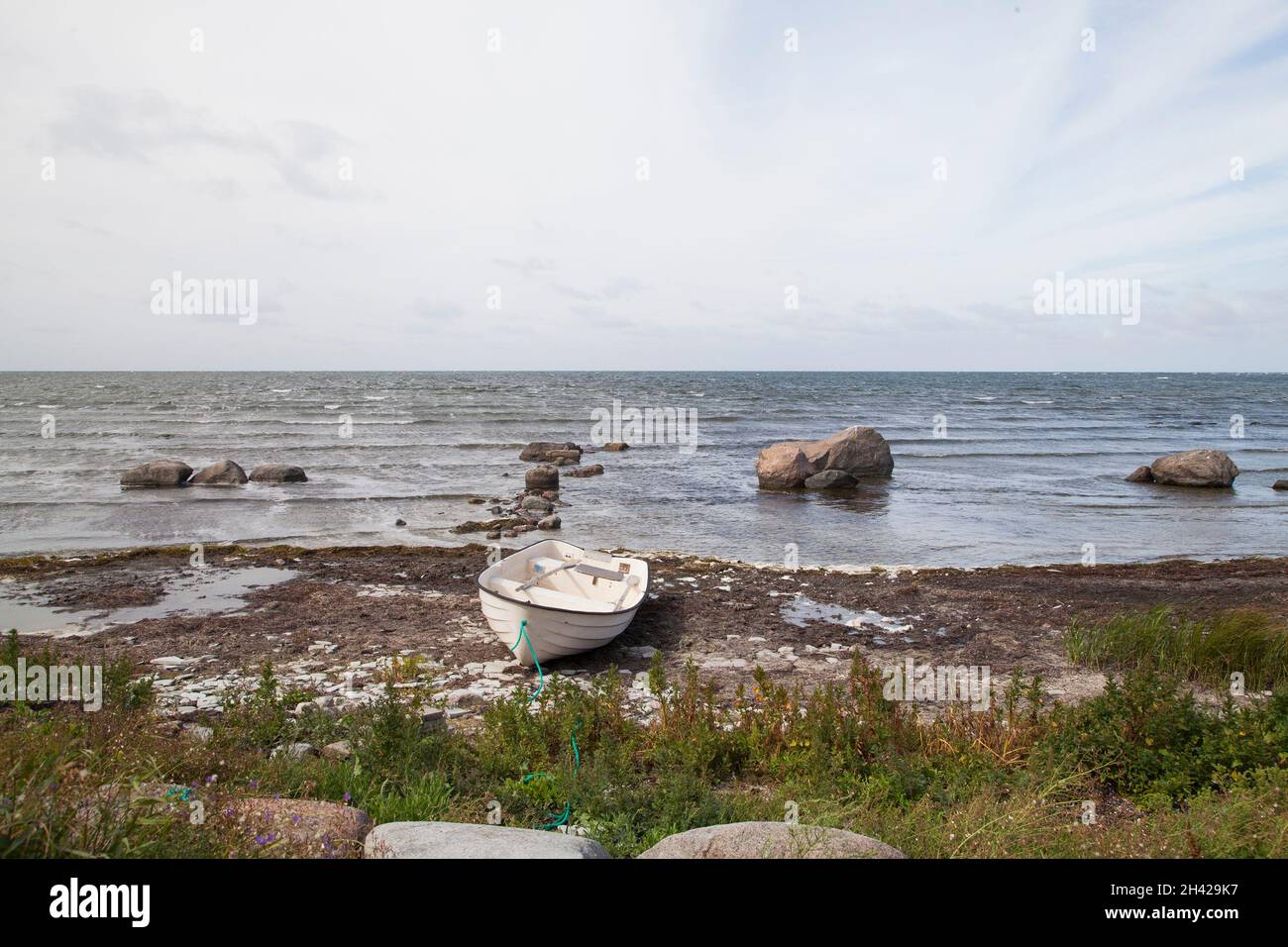 HOBURGEN Rowing boat on the beach on southern Gotland Stock Photo