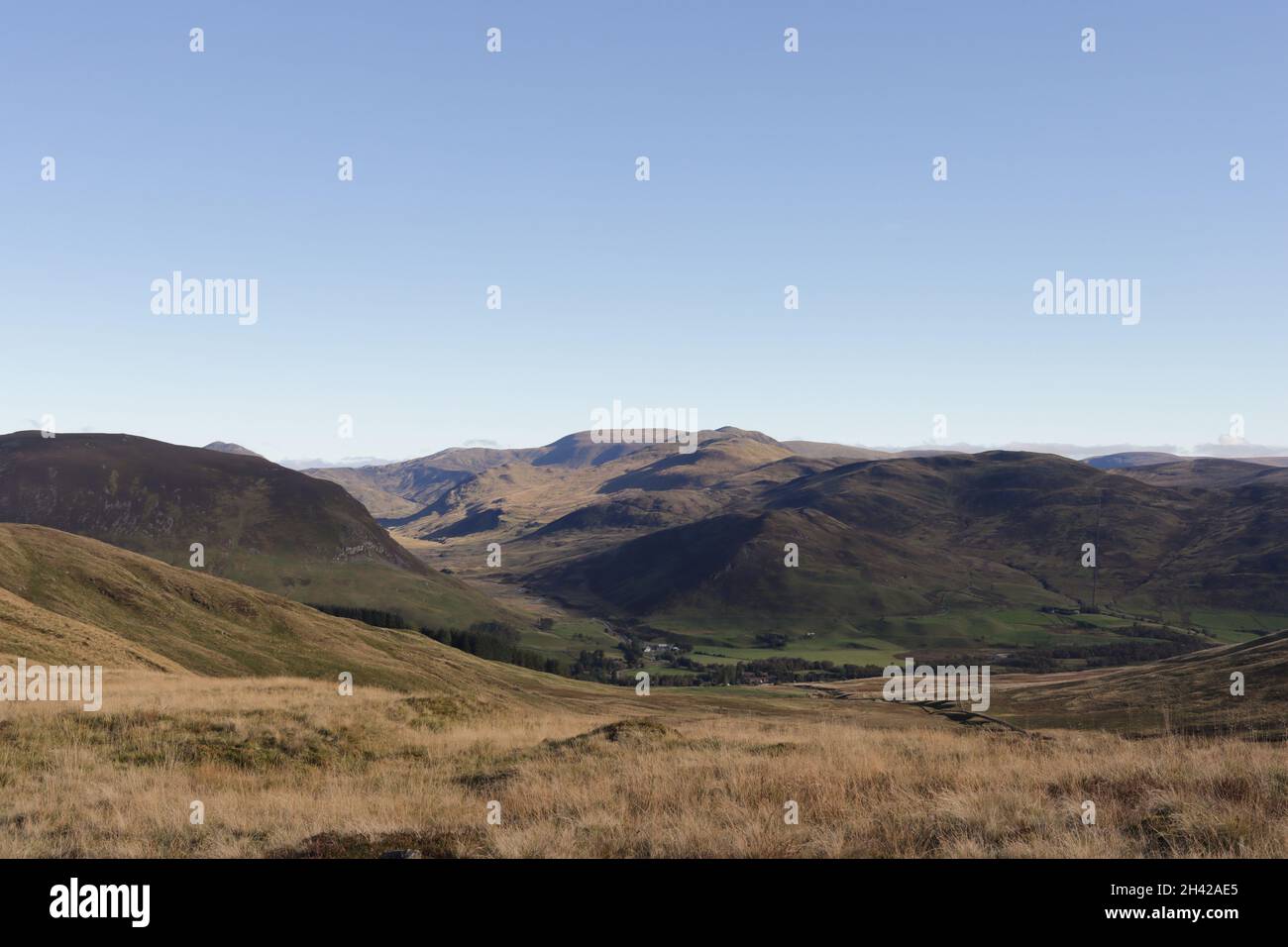 The highest point on the Cateran Trail is a pass in the mountains between Enochdu and Spittal of Glenshee. The photograph shows the view to Spittal of Stock Photo