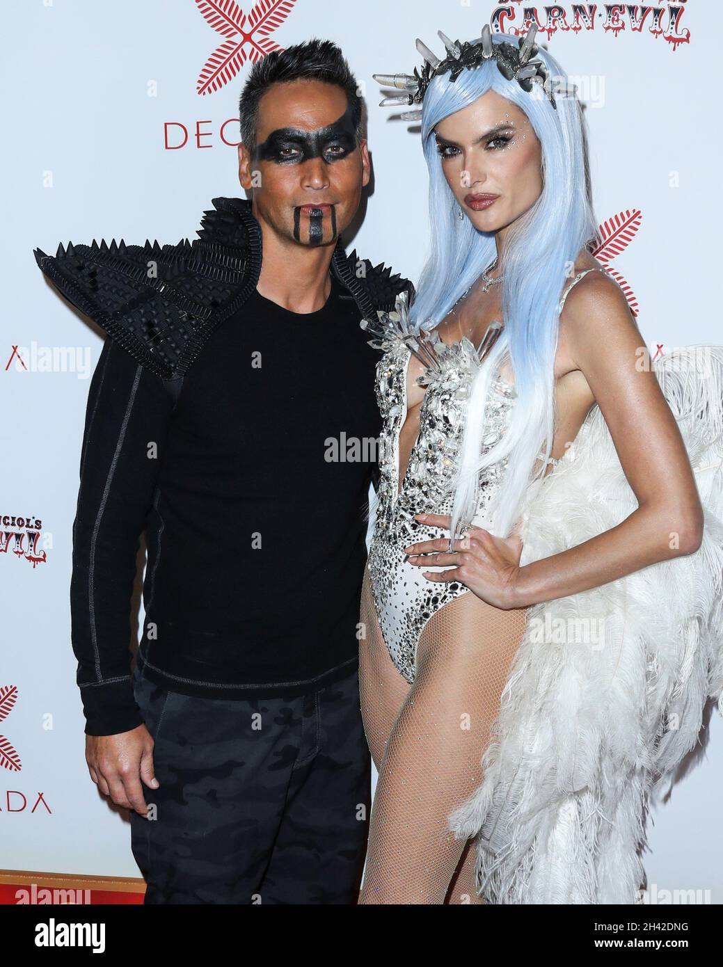 BEL AIR, LOS ANGELES, CALIFORNIA, USA - OCTOBER 30: Richard Lee and  girlfriend/model Alessandra Ambrosio arrive at Darren Dzienciol's CARN*EVIL  Halloween Party Presented by Decada and Hosted by Alessandra Ambrosio with  Live