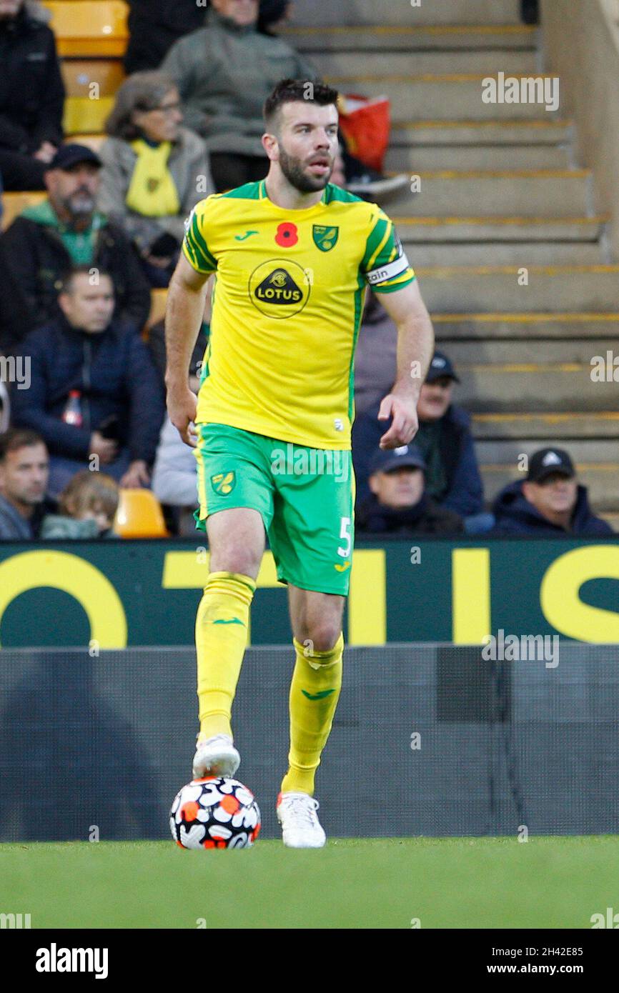 Norwich, UK. 31st Oct, 2021. Grant Hanley of Norwich City runs with the ball during the Premier League match between Norwich City and Leeds United at Carrow Road on October 31st 2021 in Norwich, England. (Photo by Mick Kearns/phcimages.com) Credit: PHC Images/Alamy Live News Stock Photo