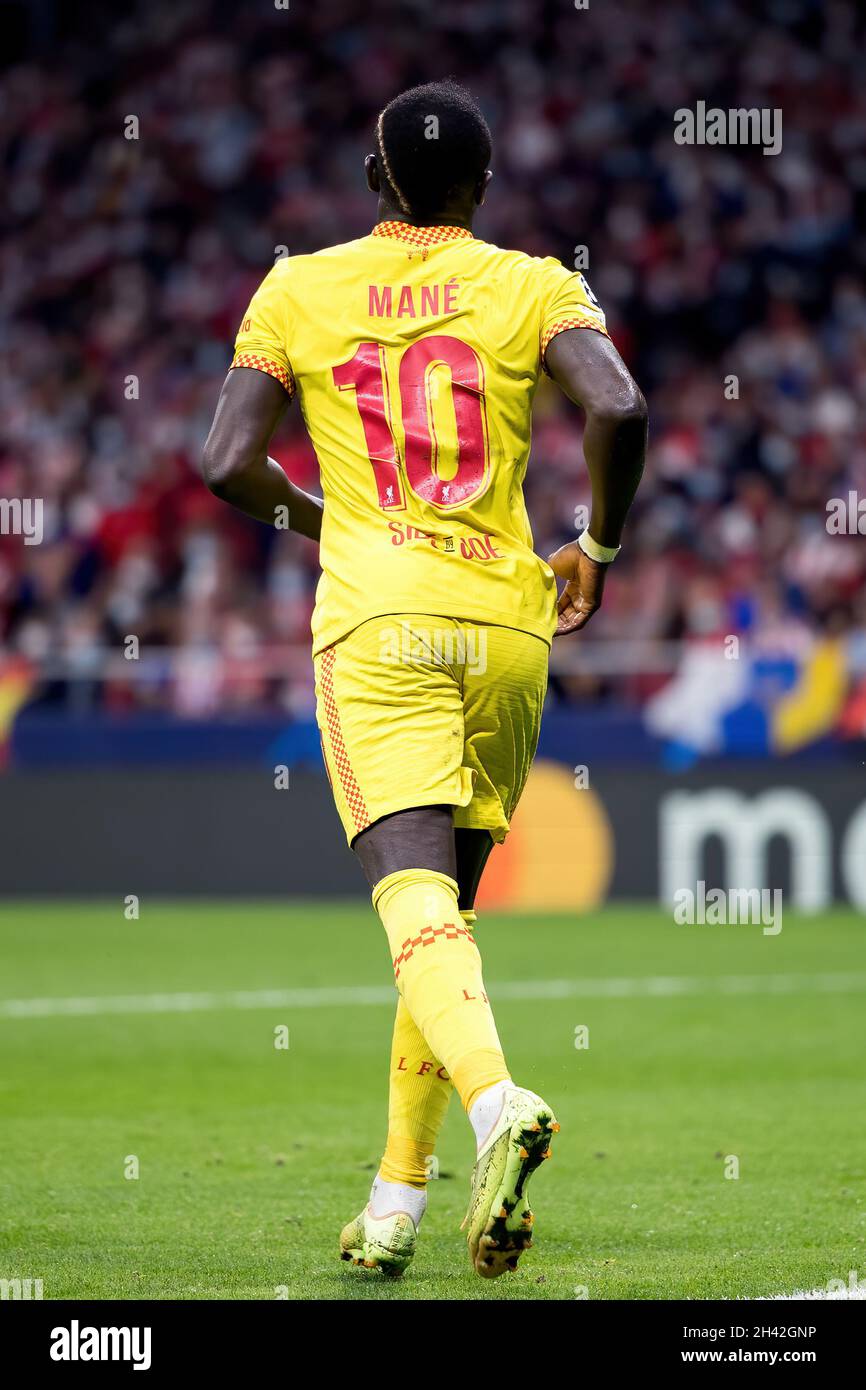 MADRID - OCT 19: Sadio Mane in action at the Uefa Champions League match between Club Atletico de Madrid and Liverpool FC de Futbol at the Metropolita Stock Photo