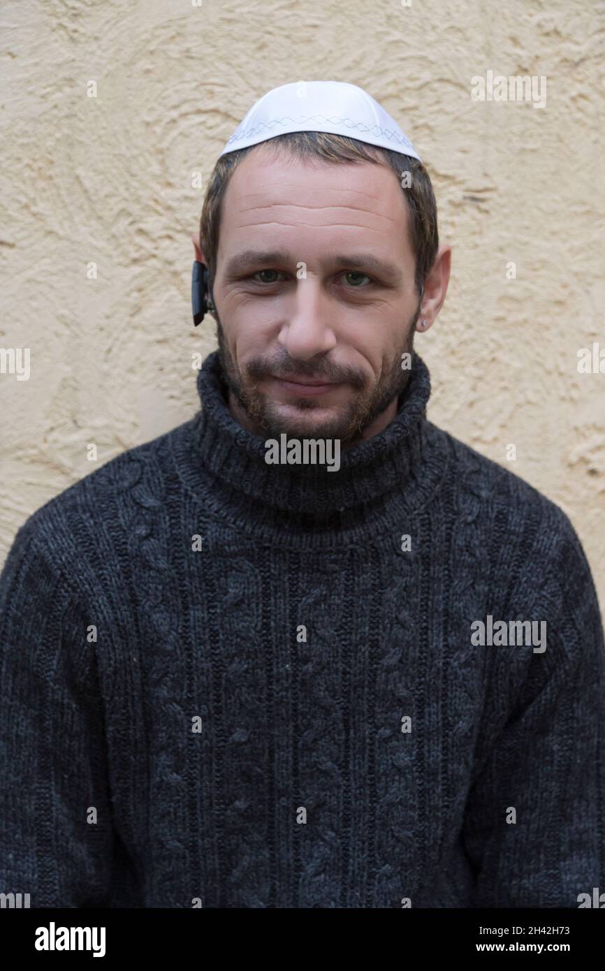 Jewish man wearing kippah in Hebrew or yarmulke (cloth cap