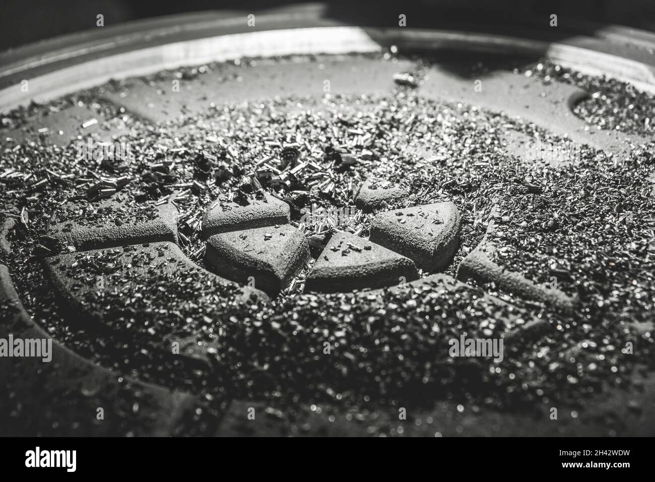 Chips after processing the cast iron hatch on the carousel machine in
