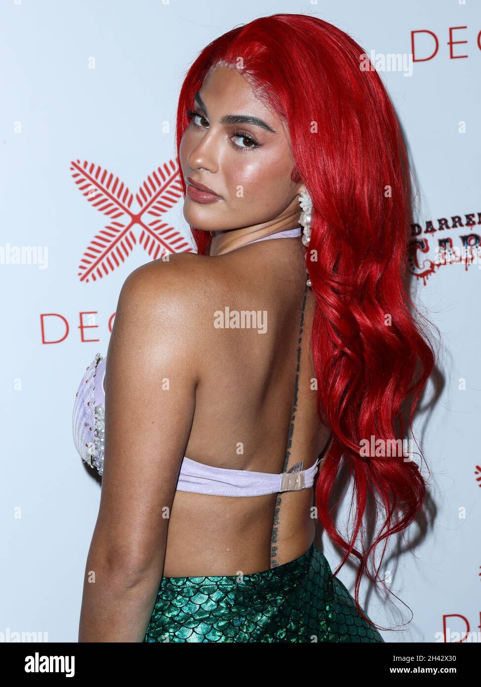 BEL AIR, LOS ANGELES, CALIFORNIA, USA - OCTOBER 30: Amanda Trivizas arrives  at Darren Dzienciols CARN*EVIL Halloween Party Presented by Decada and  Hosted by Alessandra Ambrosio with Live performances by Doja Cat