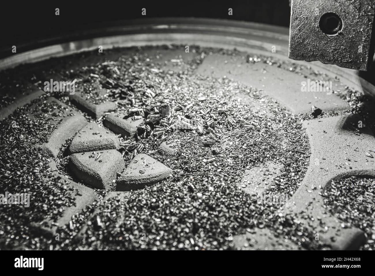 Chips after processing the cast iron hatch on the carousel machine in