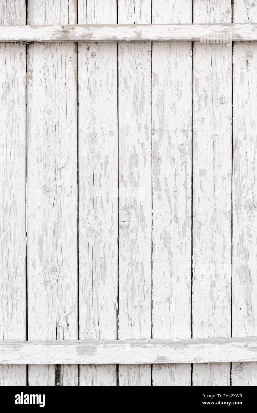 Background of weathered white planks, bright worn surface texture as