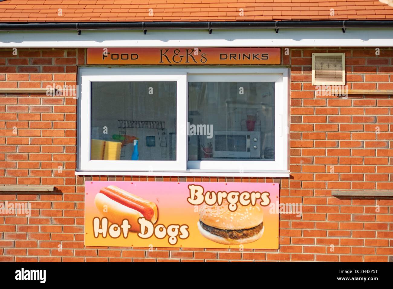 The serving window of the K&K food shack, a seller of hotdogs and ...