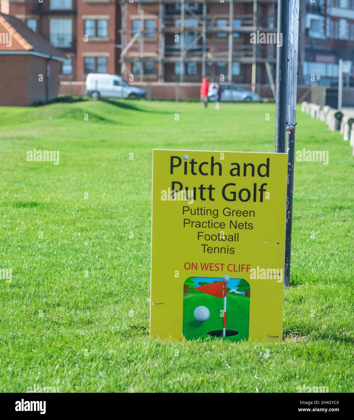 The advertising sign on the the pitch and putt golf course in West