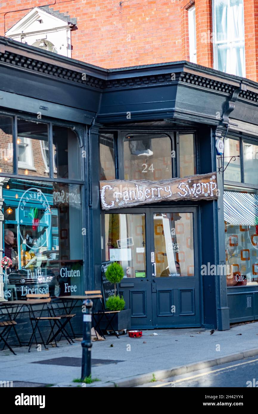 The exterior sign of the Cranberry Swamp café located down Skinner