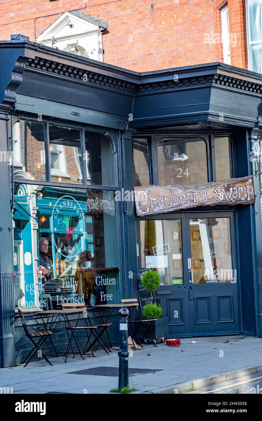 The exterior sign of the Cranberry Swamp café located down Skinner