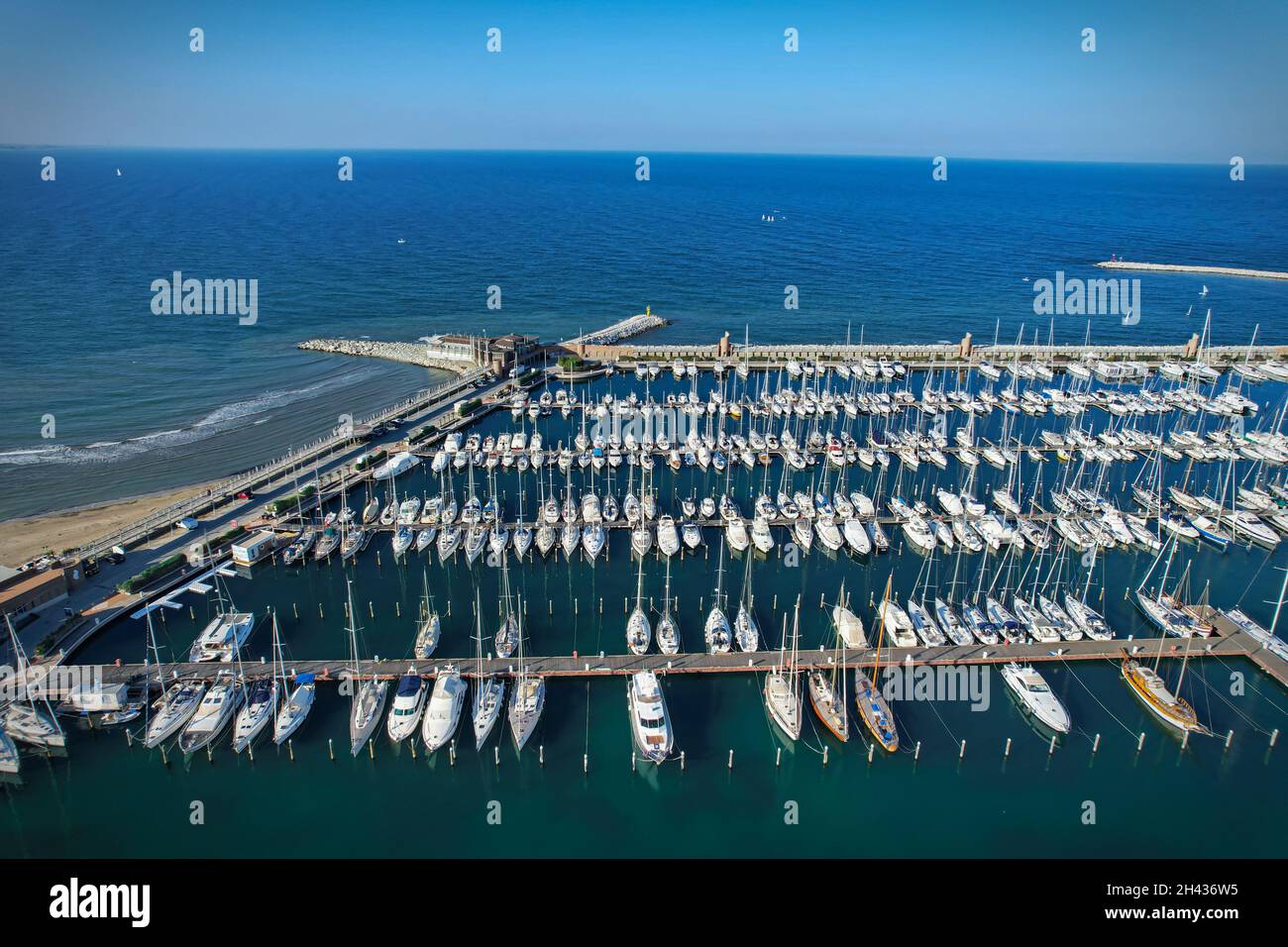 Aerial view of the marina docks with boats moored there. Rimini, Italy - October 2021 Stock Photo
