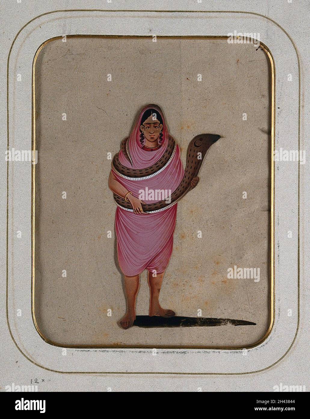 Woman with snake wrapped around her body Stock Photo - Alamy