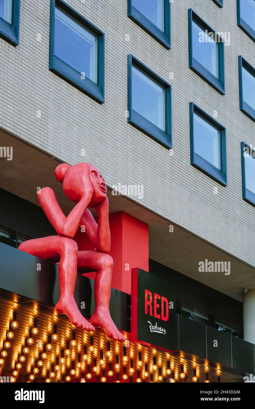 Sculpture and signage together with design elements to portray the ...