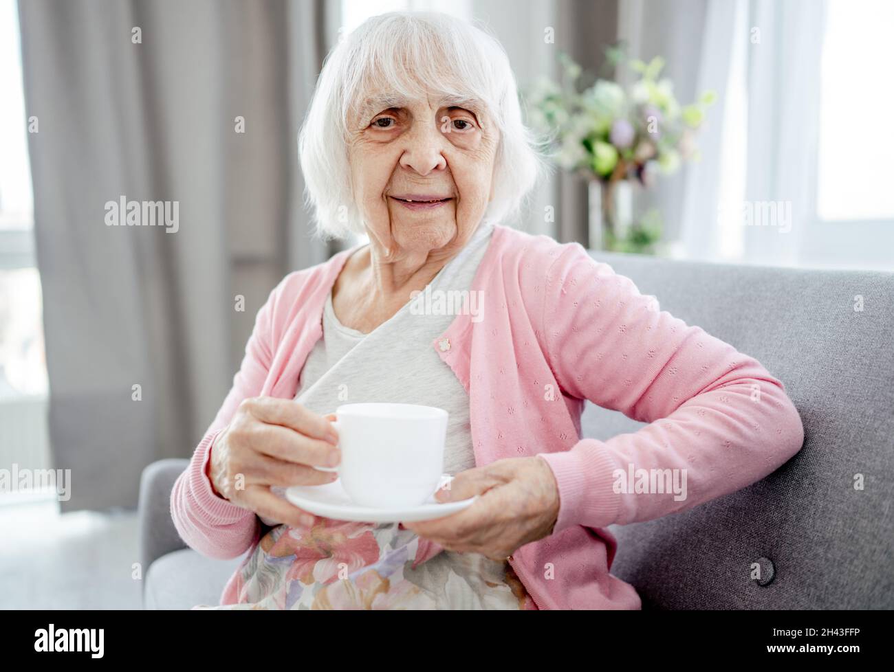 Senior woman have tea hi-res stock photography and images - Alamy