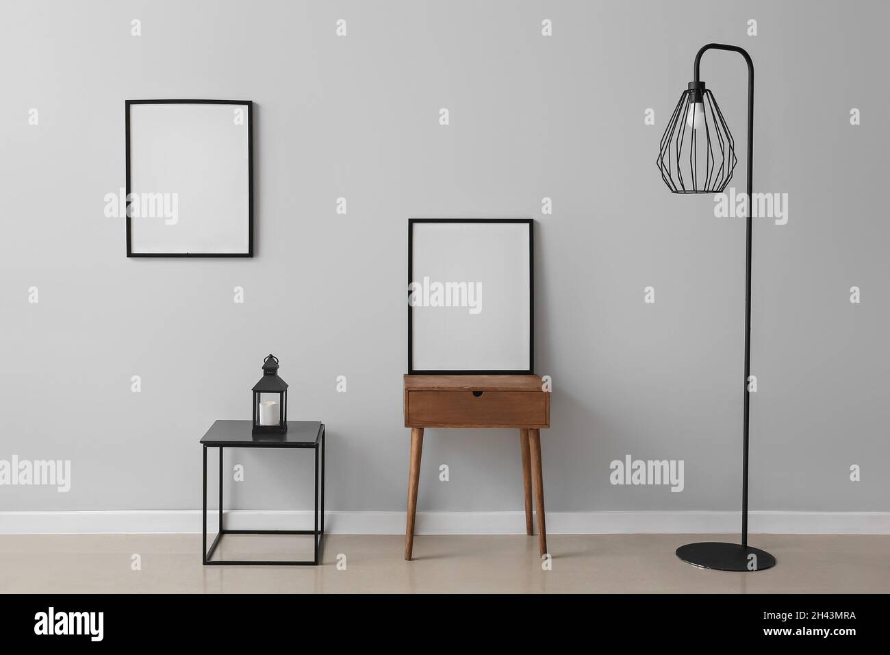 Blank poster frames with decor in modern room Stock Photo Alamy