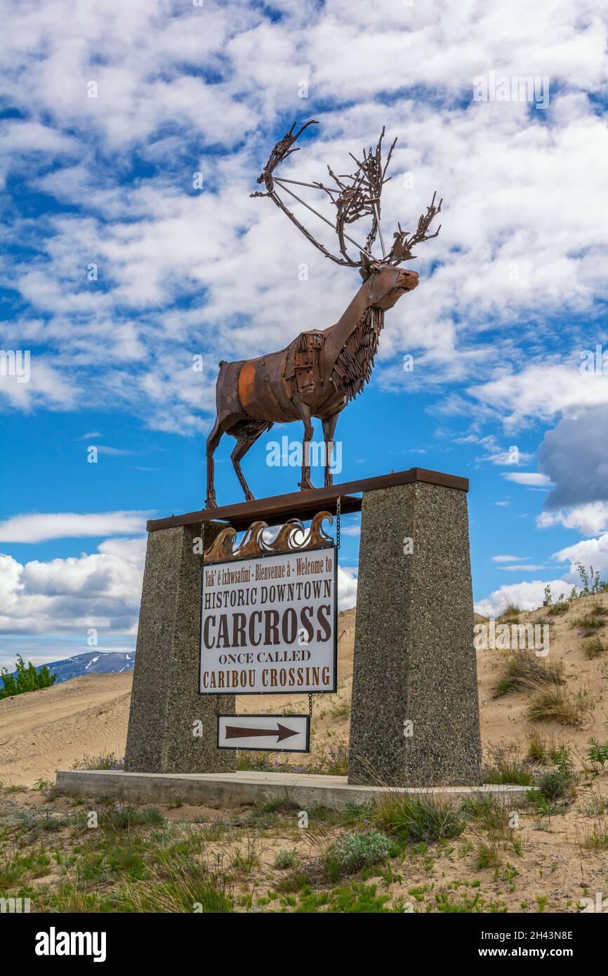 Canada, Yukon Territory, Carcross, welcome sign, caribou metal sculpture Stock Photo