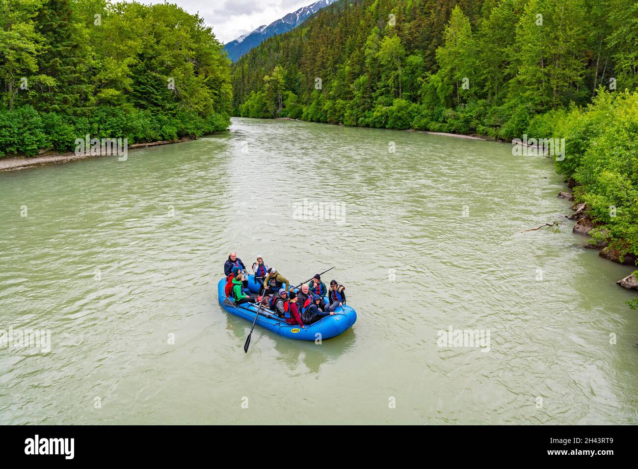 Alaska, Dyea, Klondike Gold Rush National Historical Park, Chilkoot Rail Unit, Taiya River, participants in hike and float excursion Stock Photo