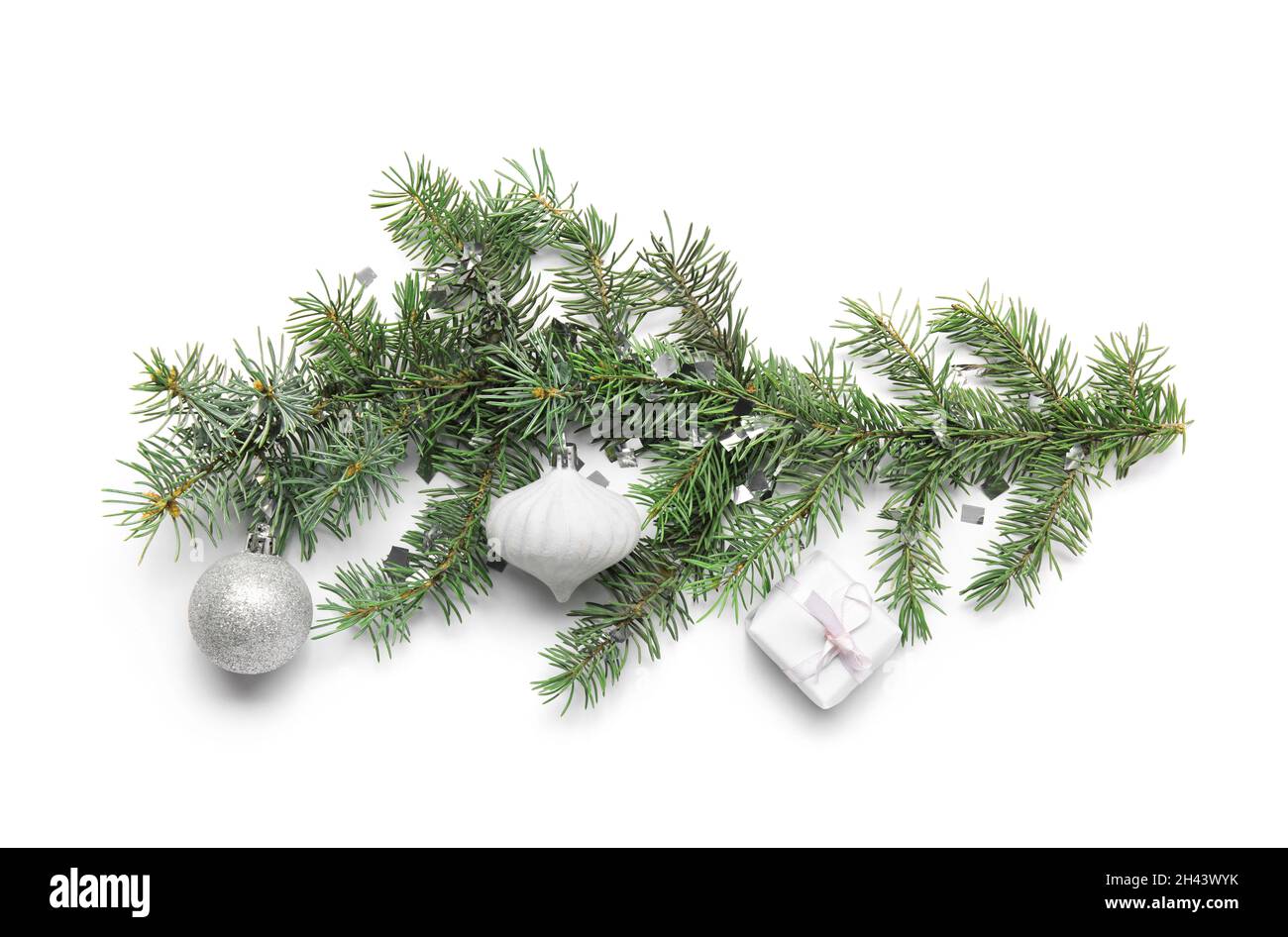 Fir branches and Christmas balls on white background Stock Photo - Alamy
