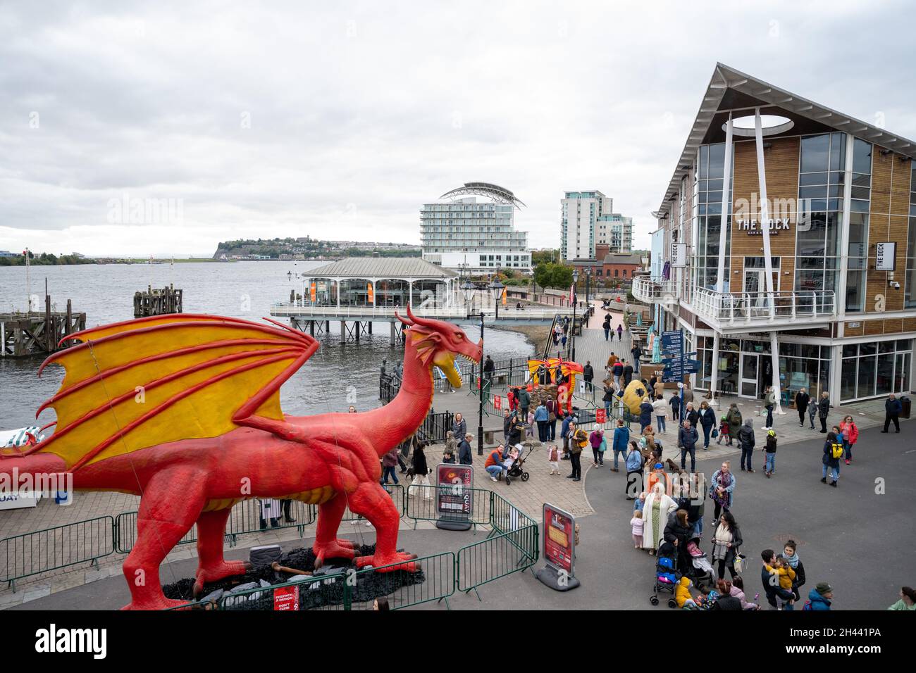 CARDIFF, WALES - OCTOBER 23: A 15-metre-long and six-metre-tall animatronic dragon in Tacoma Square, Mermaid Quay on October 23, 2021 in Cardiff, Wale Stock Photo
