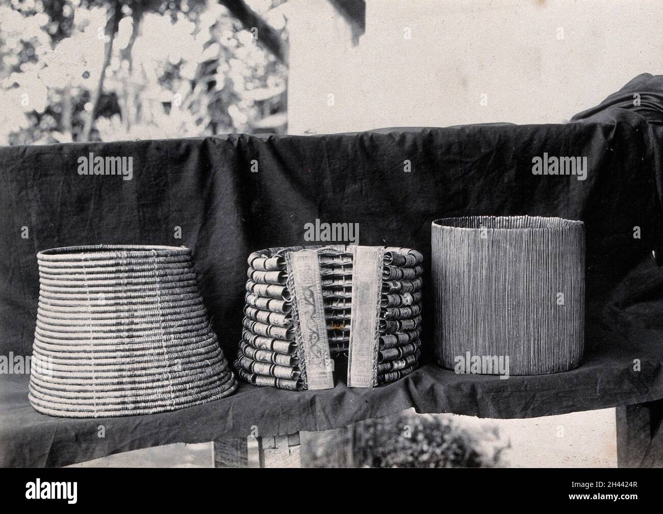 Sarawak: three corsets worn by native Sea Dayak and Land Dayak women. Photograph. Stock Photo