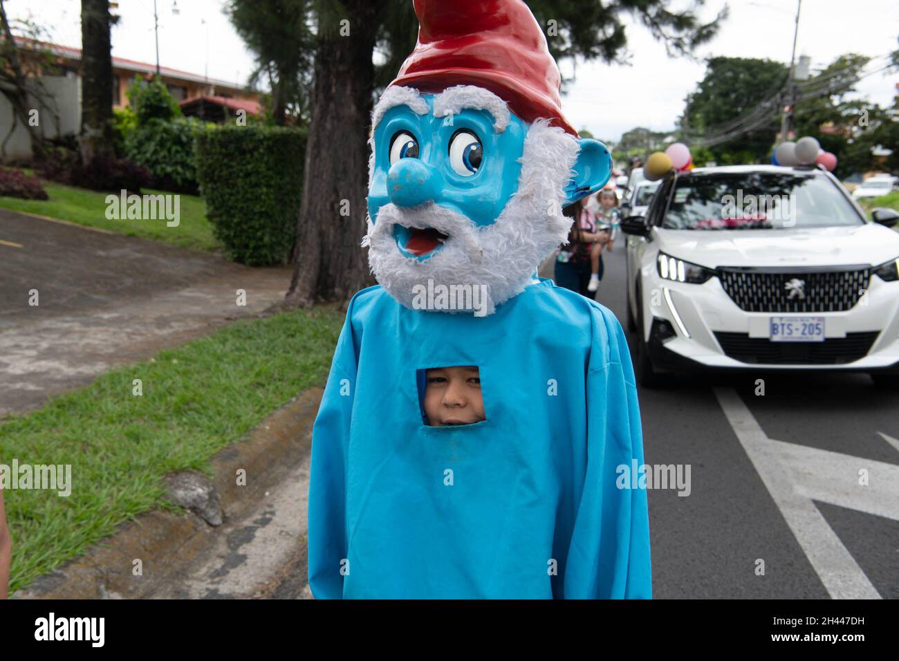 Escazu, San Jose, Costa Rica. 31st Oct, 2021. DÃ-a de la Mascarada, or Day of the Masquerade, is an annual celebration that blends Spanish and Costa Rican tradition into a unique holiday.With Costa Rican music playing and costumed characters dancing through the streets, the day is full of festivities ""“ and a few spooks, too.Parades were held in the San Jose suburbs of Escazu and San Antonio, meeting up at the Escazu Municipal Civic Center. (Credit Image: © Avi Adelman/ZUMA Press Wire) Stock Photo