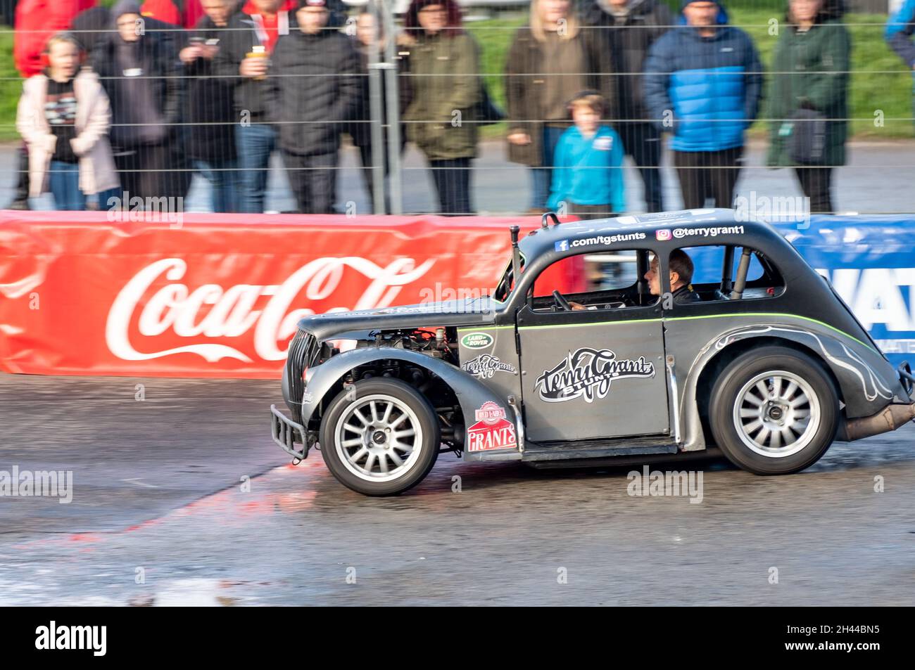 The World famous stunt driver Terry Grant putting on a dangerous stunt ...