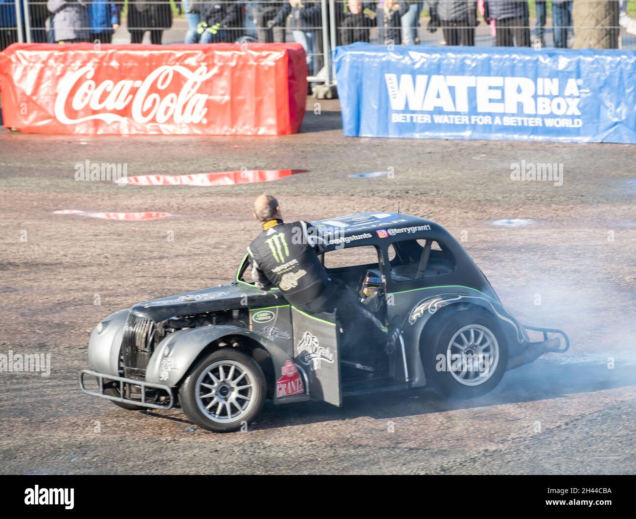 The World famous stunt driver Terry Grant putting on a dangerous stunt show at the Flame & Thunder event at Santa Pod race way, October 2021 Stock Photo