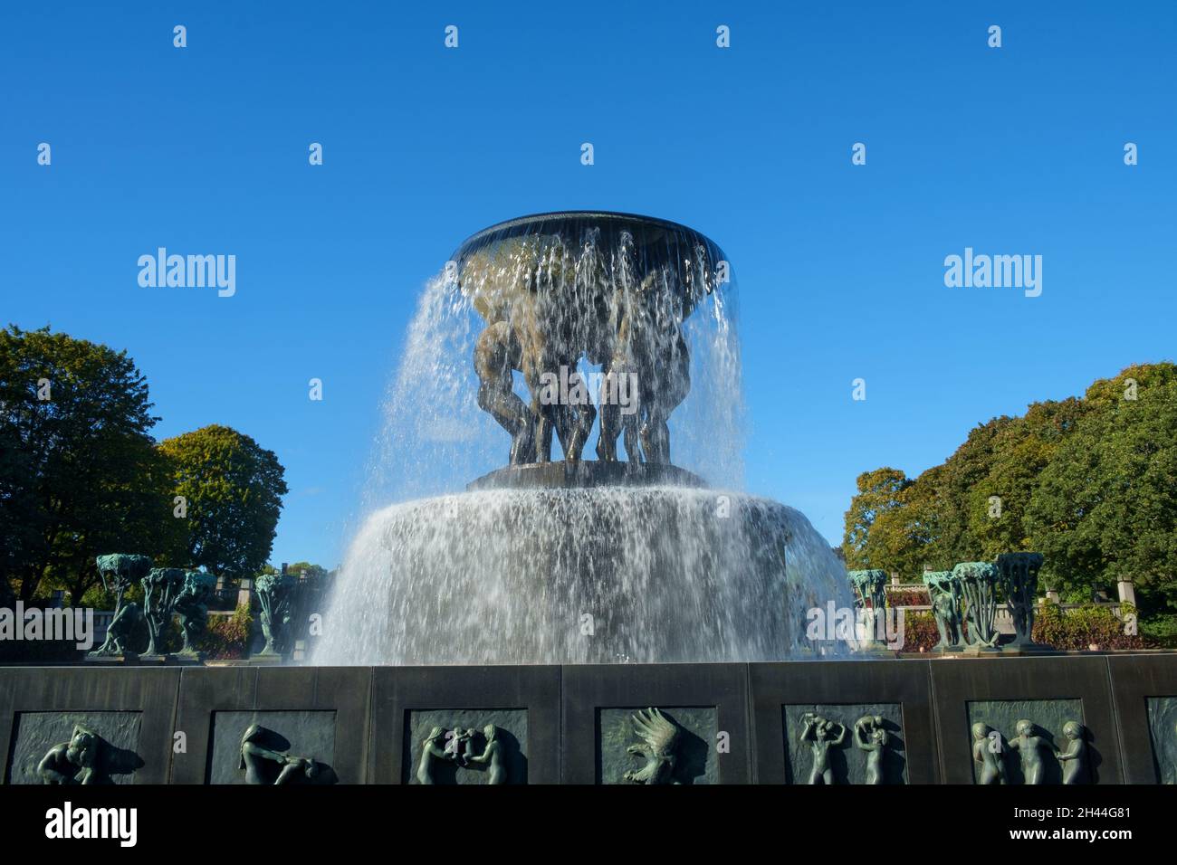 Oslo, Norway - October 7th 2016: Vigeland Sculpture Park. Fountain featuring six bronze men holding a bowl of cascading water on their shoulders. Stock Photo